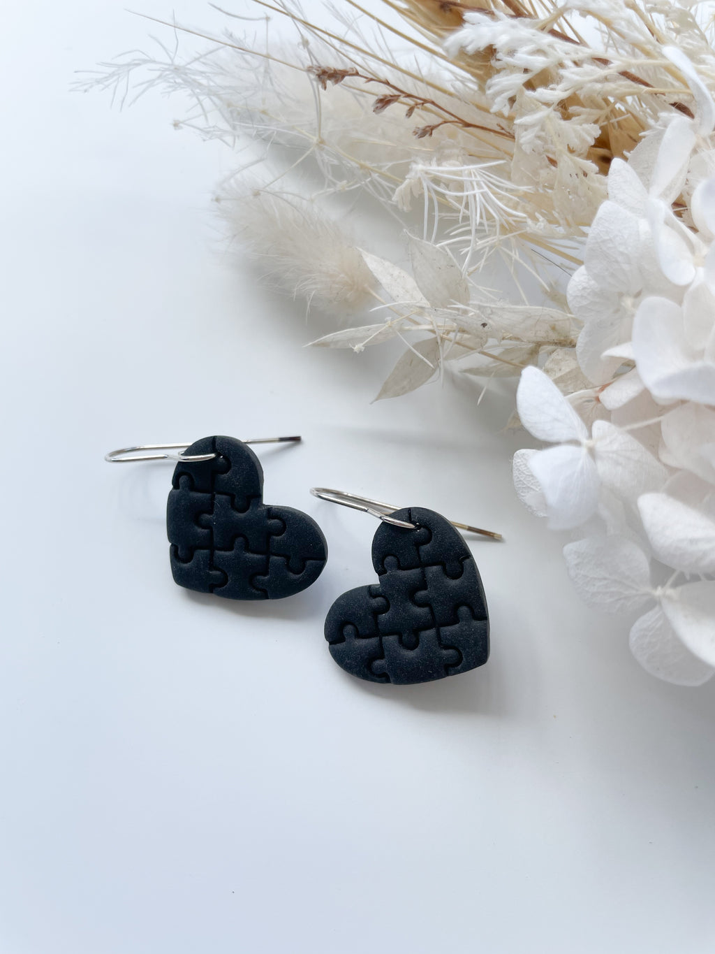 Black Puzzle Hearts