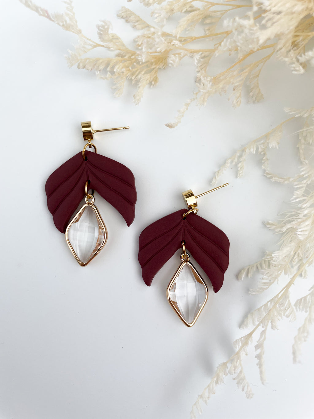 Maroon diamond drops