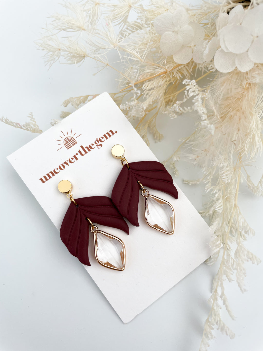 Maroon diamond drops