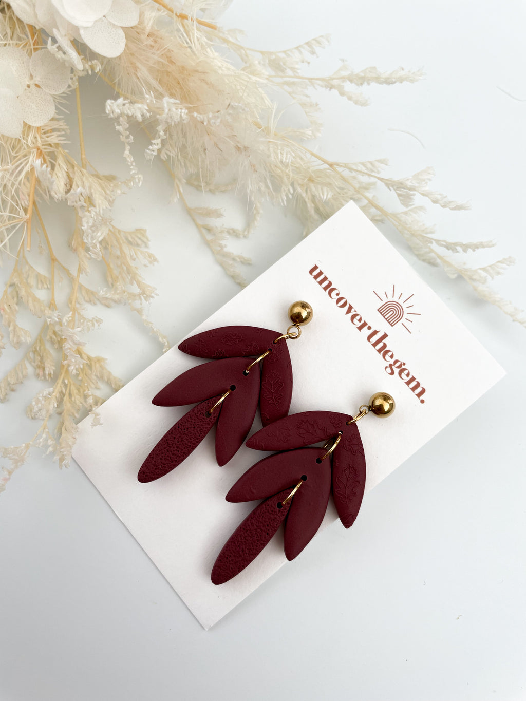 Maroon leaf drop