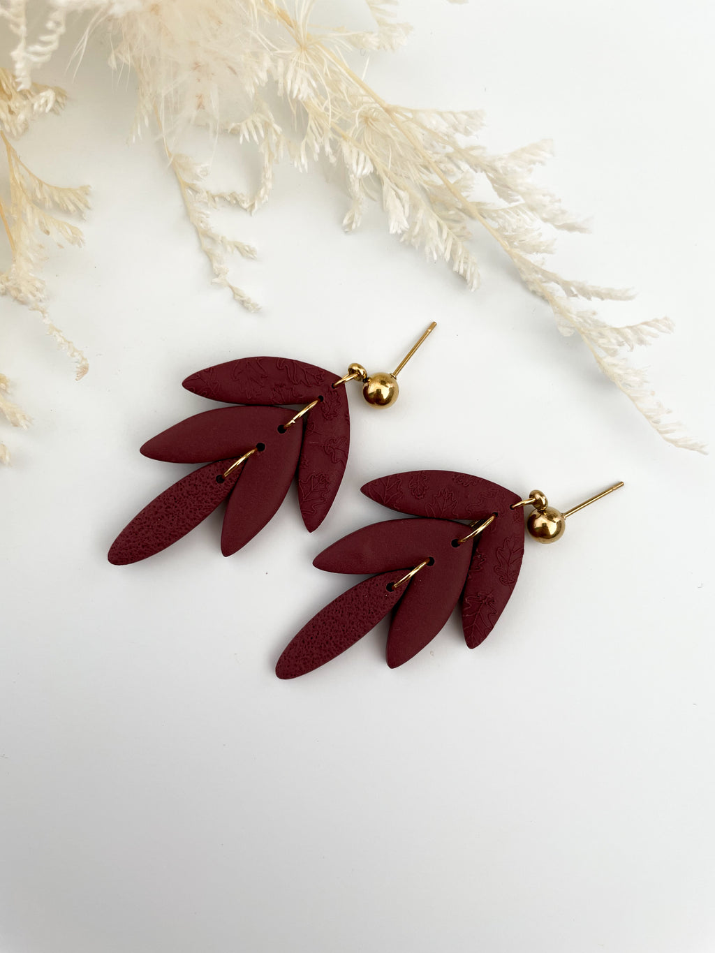 Maroon leaf drop
